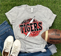 a shirt that says tigers with a football and a pair of jeans