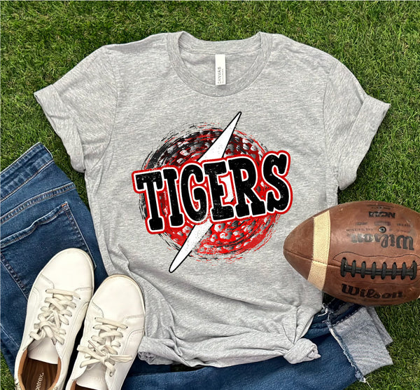 a shirt that says tigers with a football and a pair of jeans